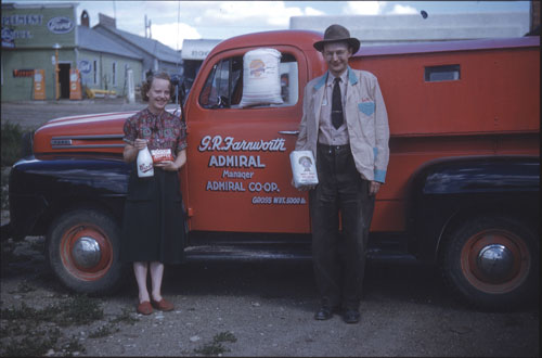 George and Mary Farnsworth proudly display Co-op products, Admiral, 